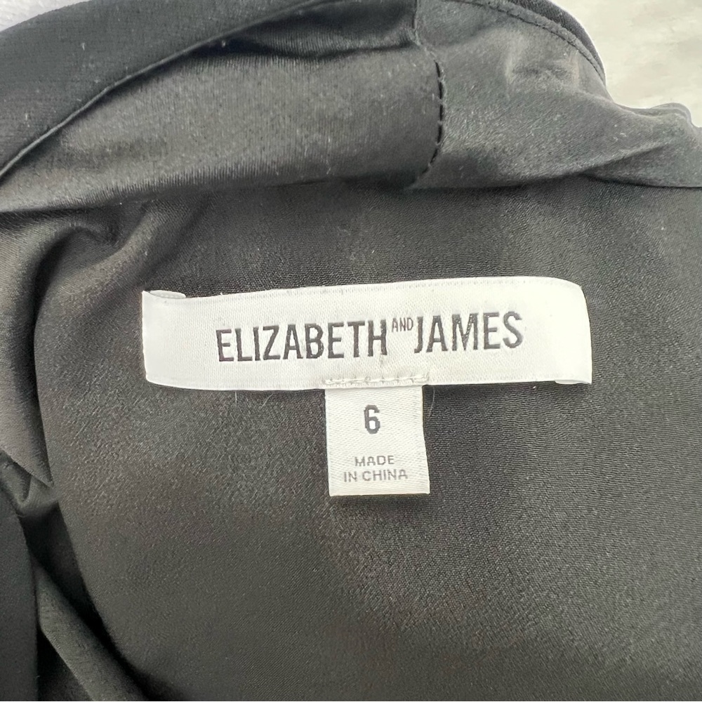 Elizabeth and James black sleeveless dress with tie in front. - Picture 10 of 12